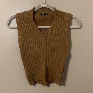 One size fits all brown Brandy Melville sweater vest, good for spring weather.
